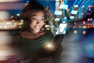 Frau blickt auf ihr Smartphone mit eingeblendeten Chat- und KI-Symbolen als Symbol für modernes Online-Dating und künstliche Intelligenz